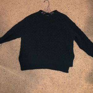 dark green sweater